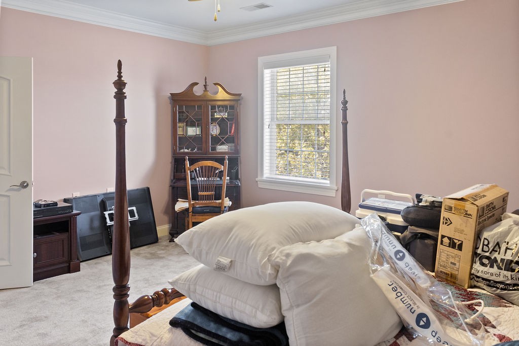 758 Holt Road Lebanon, TN 37087 - Photo 39 of 55 a bedroom with a bed and wooden floor