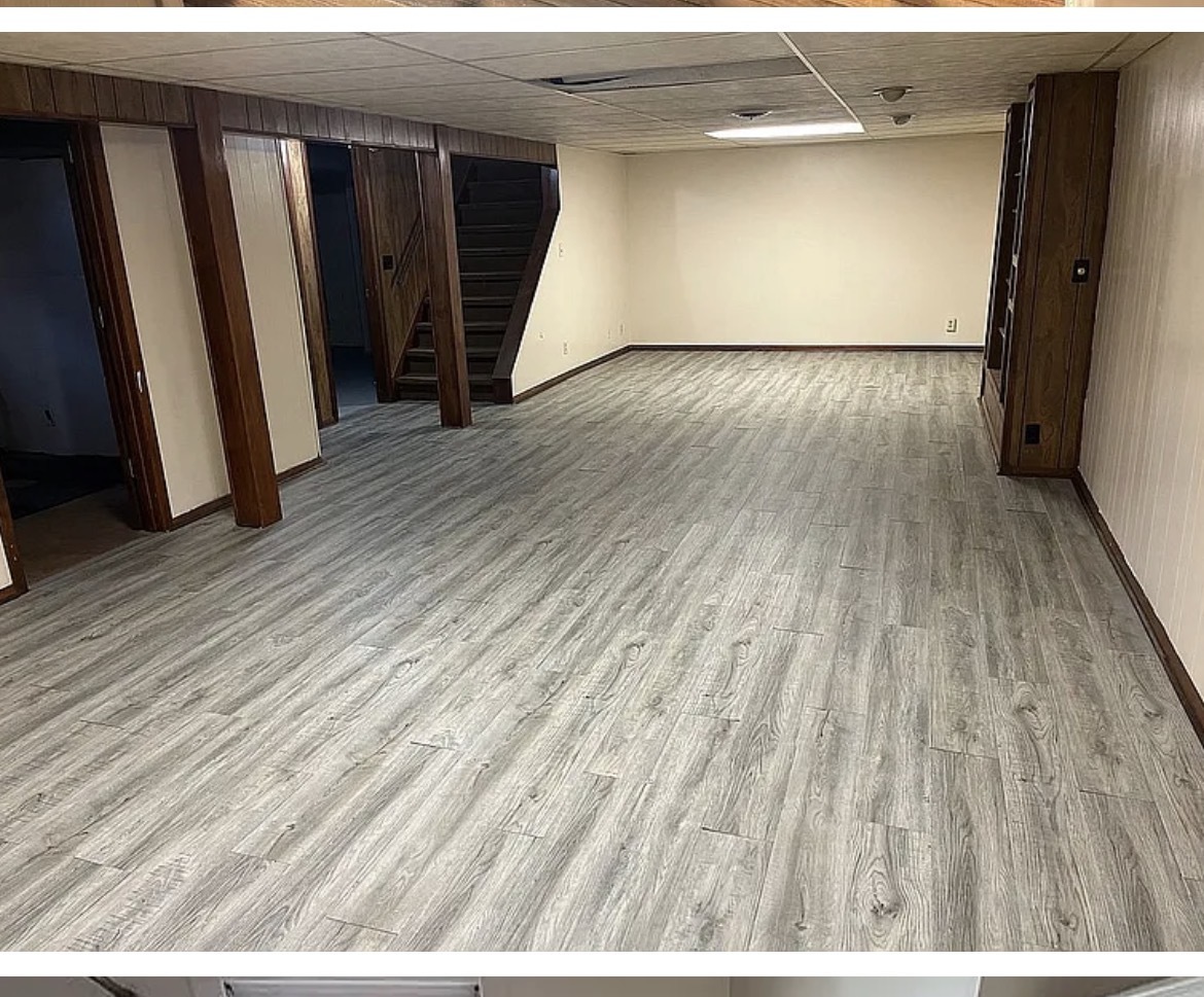 1720 Jacobssen Drive Normal, IL 61761 - Photo 9 of 13 a view of a room with wooden floor and stairs