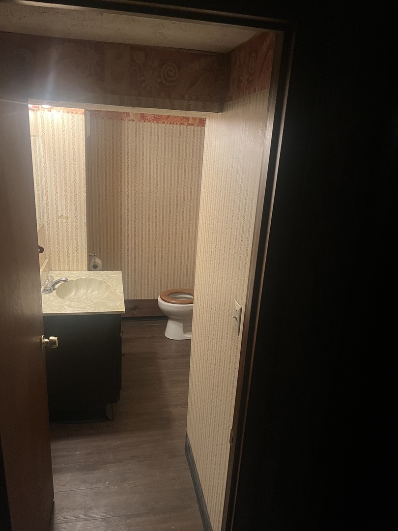 1720 Jacobssen Drive Normal, IL 61761 - Photo 10 of 13 a bathroom with a sink and a toilet