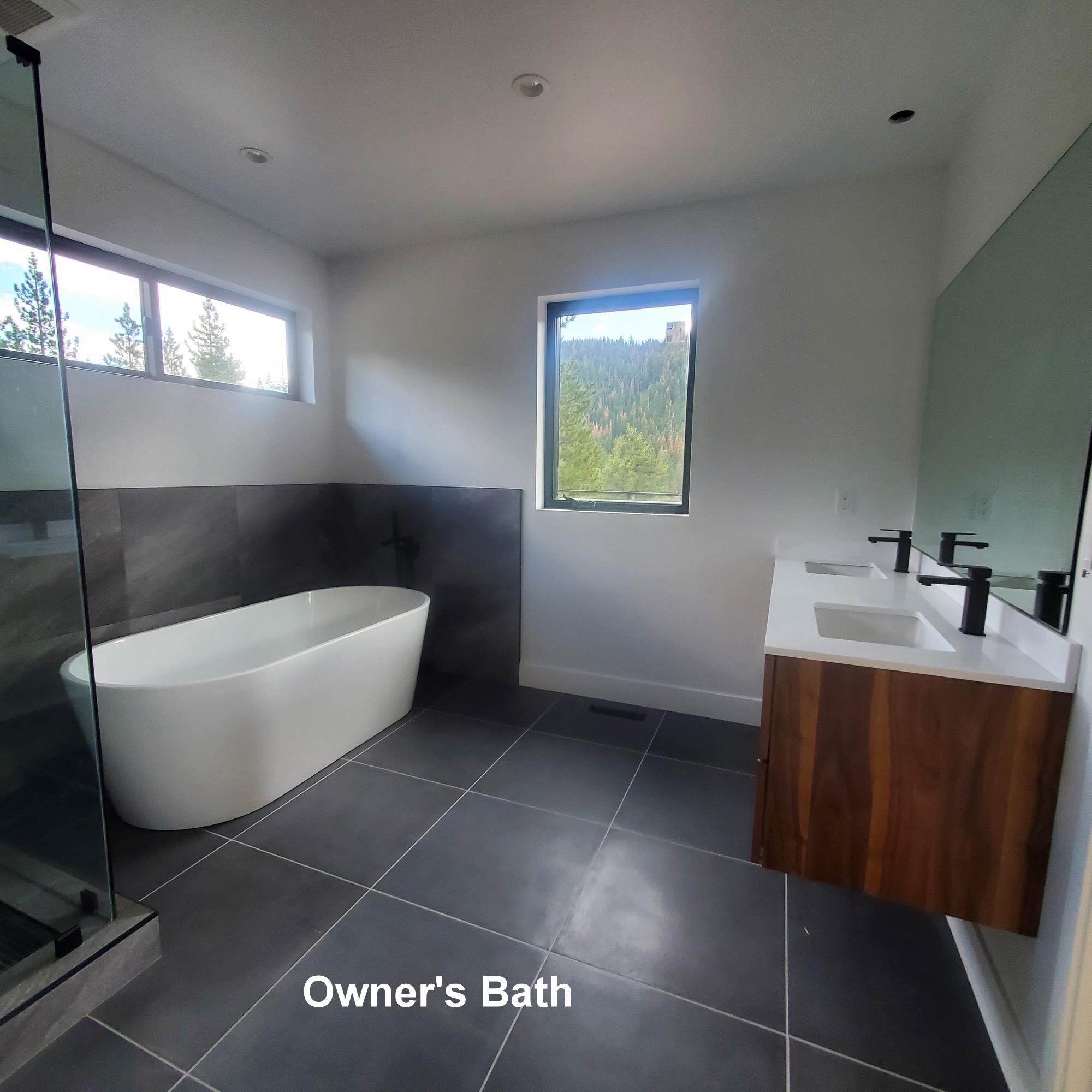 1423 Juniper Mountain Road Alpine Meadows, CA 96146 - Photo 5 of 8 a bathroom with a bathtub and sink
