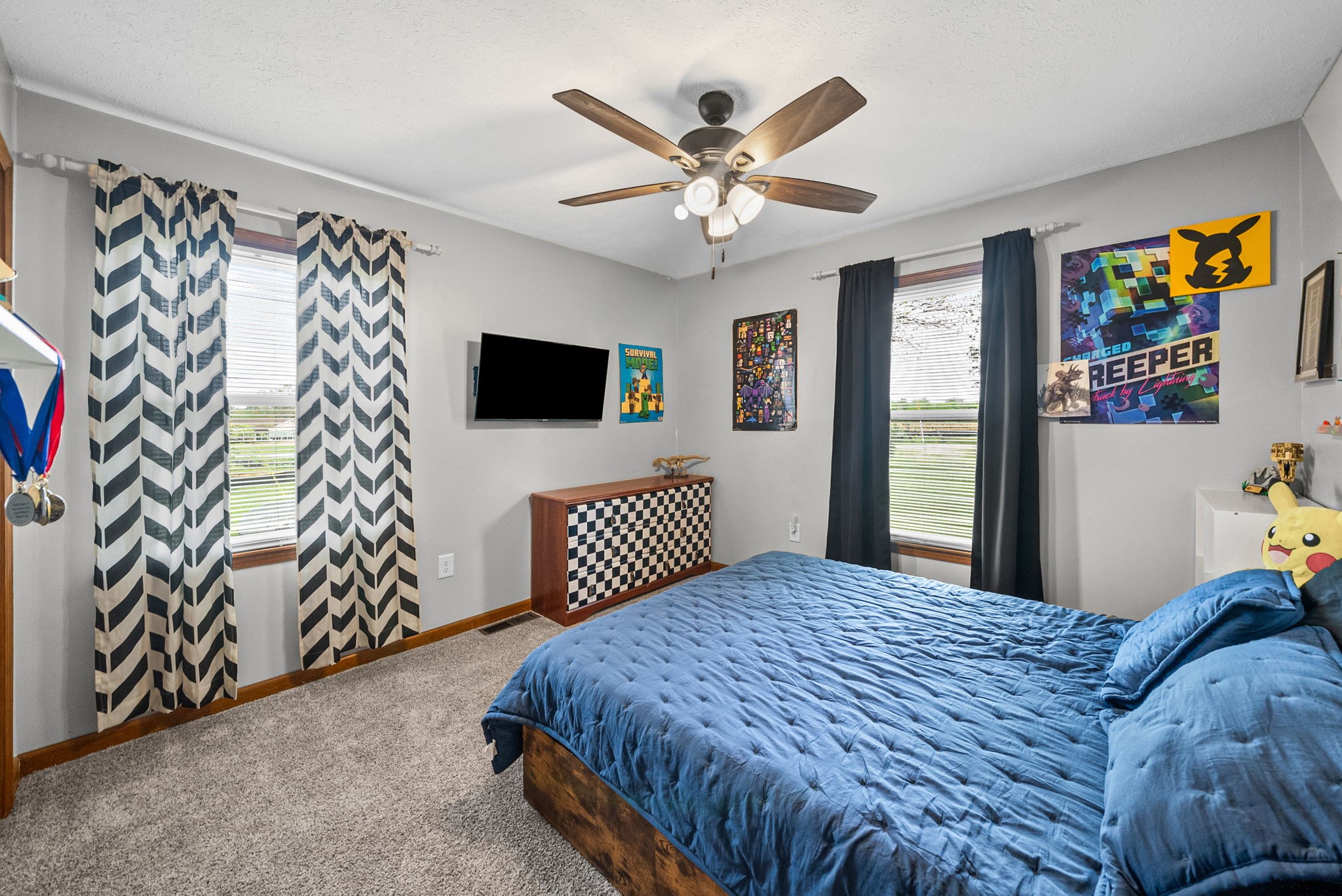 3801 Allegre Road Elkton, KY 42220 - Photo 19 of 36 a bedroom with a bed and a chandelier