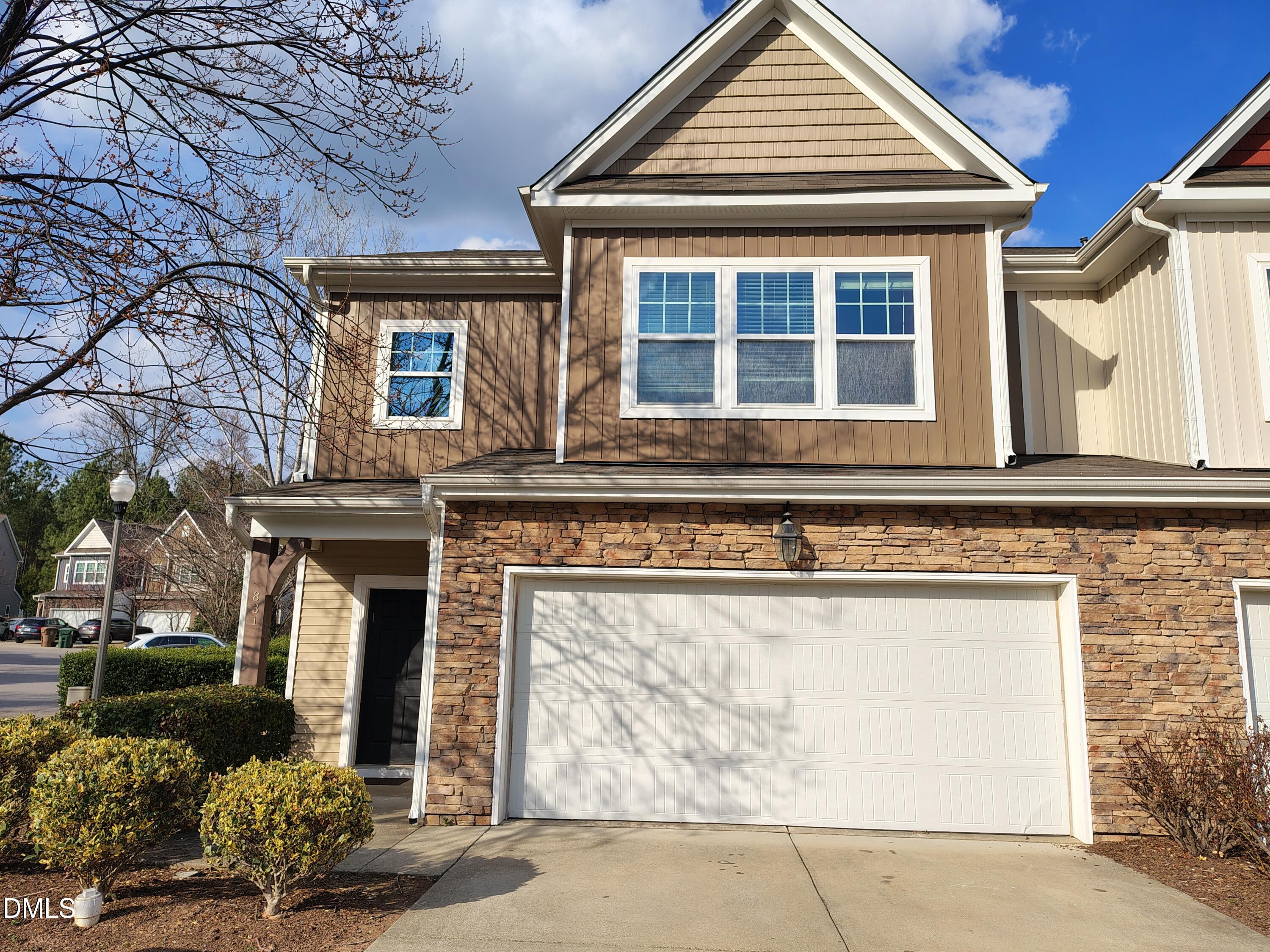 831 Davidson Point Road Cary, NC 27513 - Photo 1 of 22 a front view of a house with garden