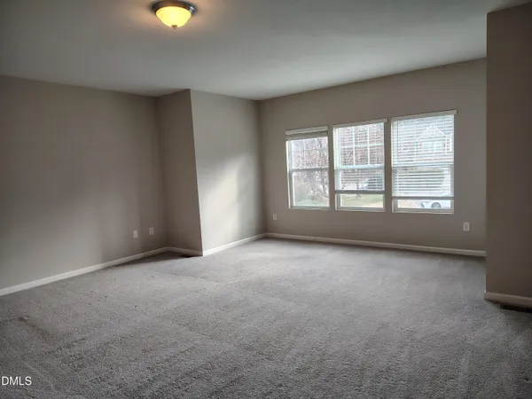an empty room with window