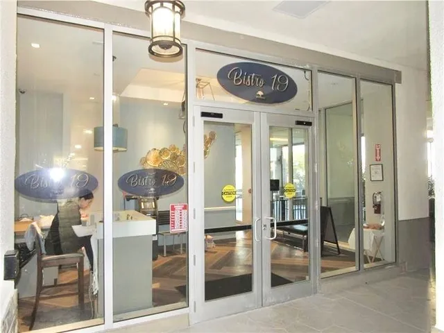 a view of a hallway with elevator