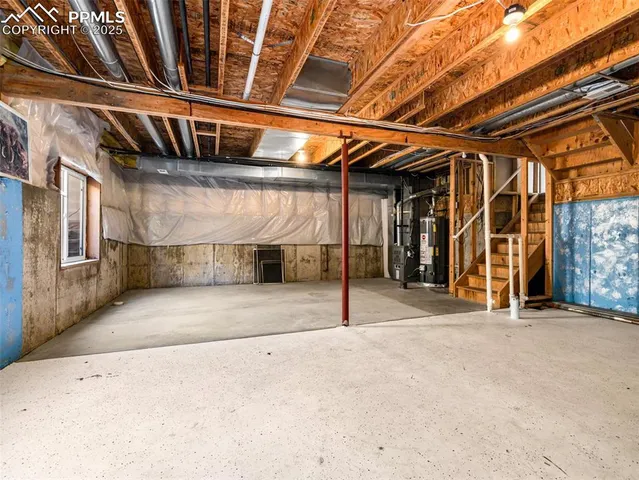 a view of a garage with wooden wall