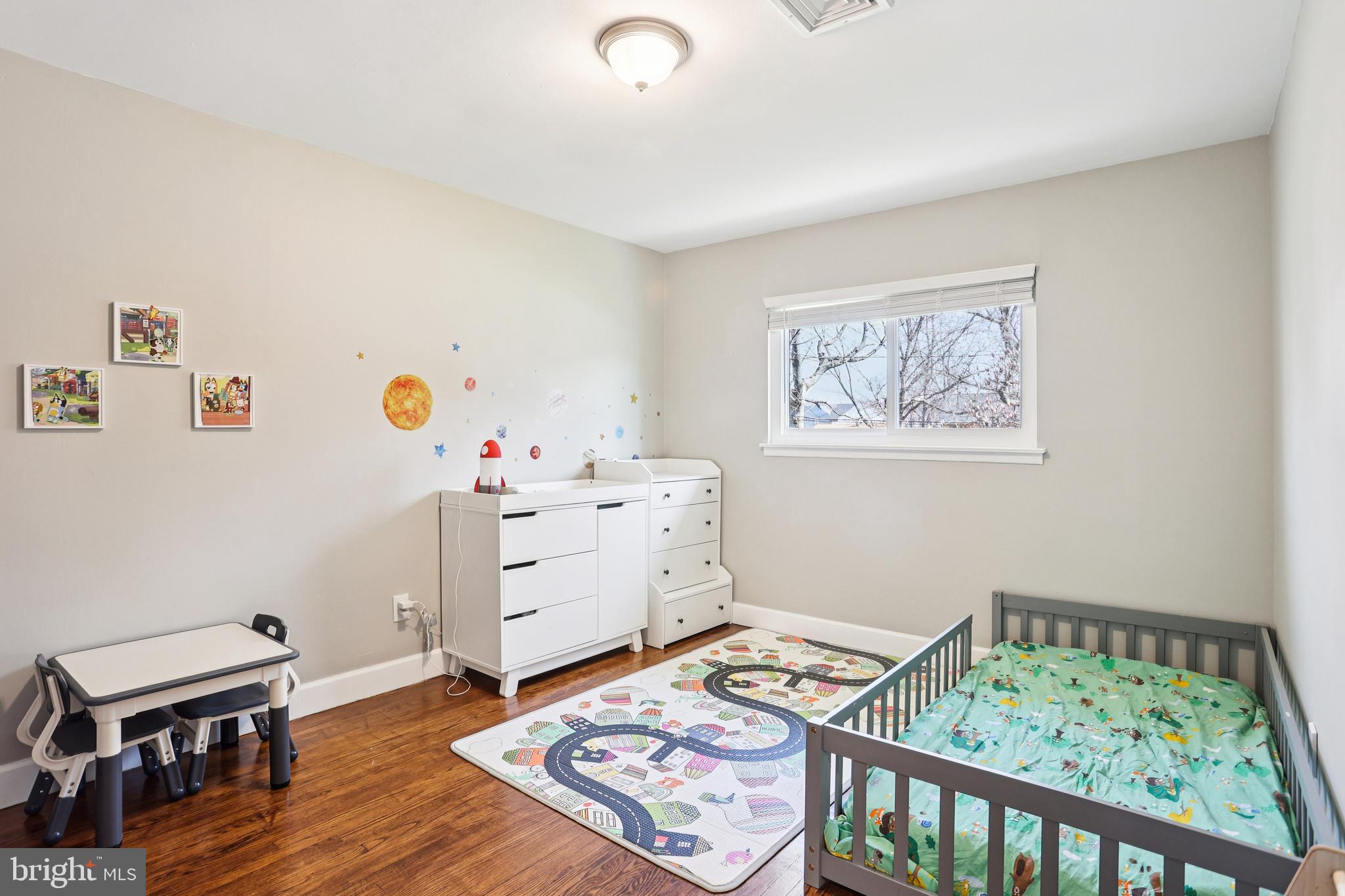 15 Brimfield Road Audubon, PA 19403 - Photo 21 of 41 a room that has a bed and a table in it