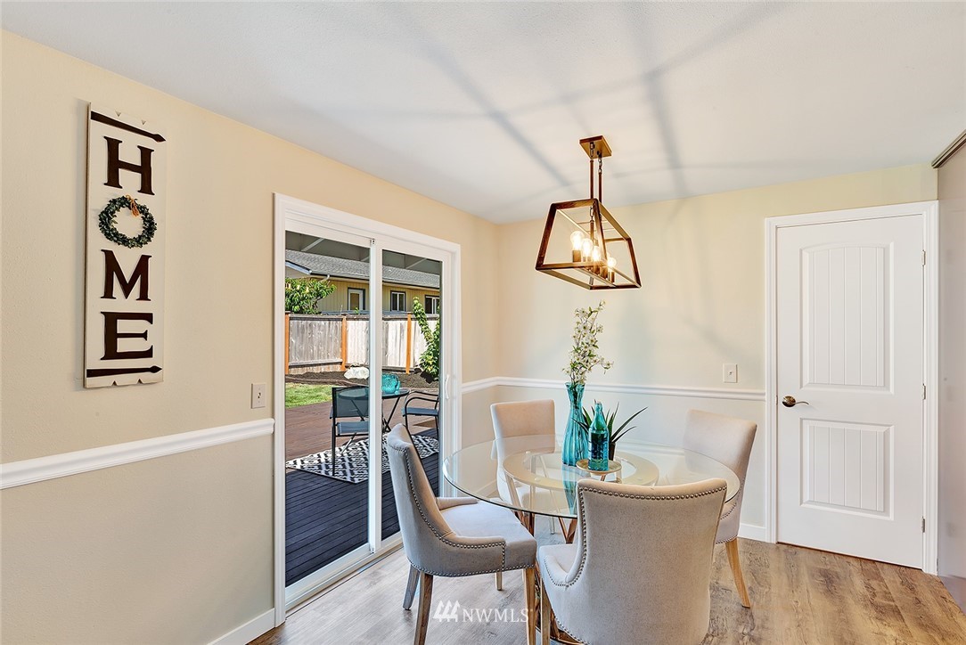 2212 Edmonds Avenue Northeast Renton, WA 98056 - Photo 11 of 18 a dining room with furniture and window
