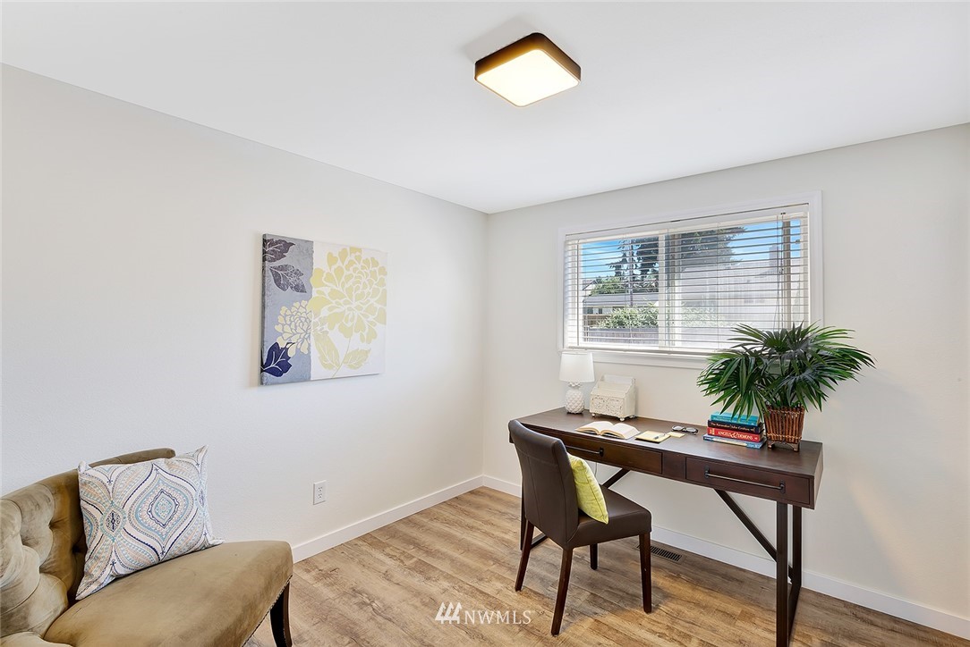 2212 Edmonds Avenue Northeast Renton, WA 98056 - Photo 14 of 18 a workspace with furniture and a potted plant