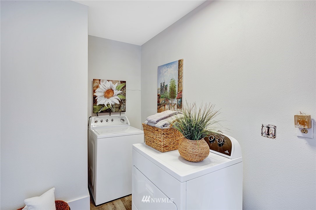 2212 Edmonds Avenue Northeast Renton, WA 98056 - Photo 16 of 18 a view of kitchen with a sink and a potted plant