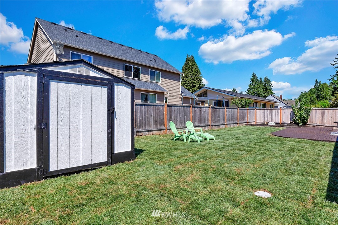 2212 Edmonds Avenue Northeast Renton, WA 98056 - Photo 18 of 18 front view of a house with a yard
