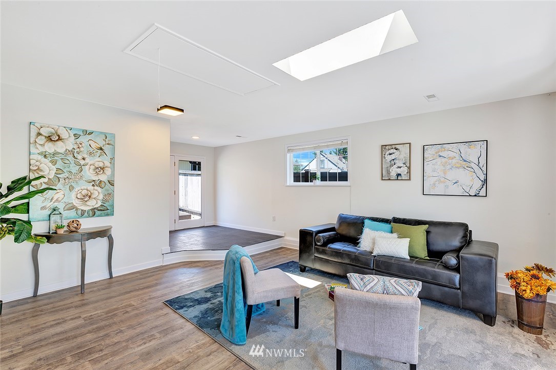 2212 Edmonds Avenue Northeast Renton, WA 98056 - Photo 5 of 18 a living room with furniture and wooden floor