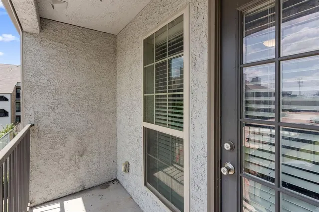 a view of balcony and window