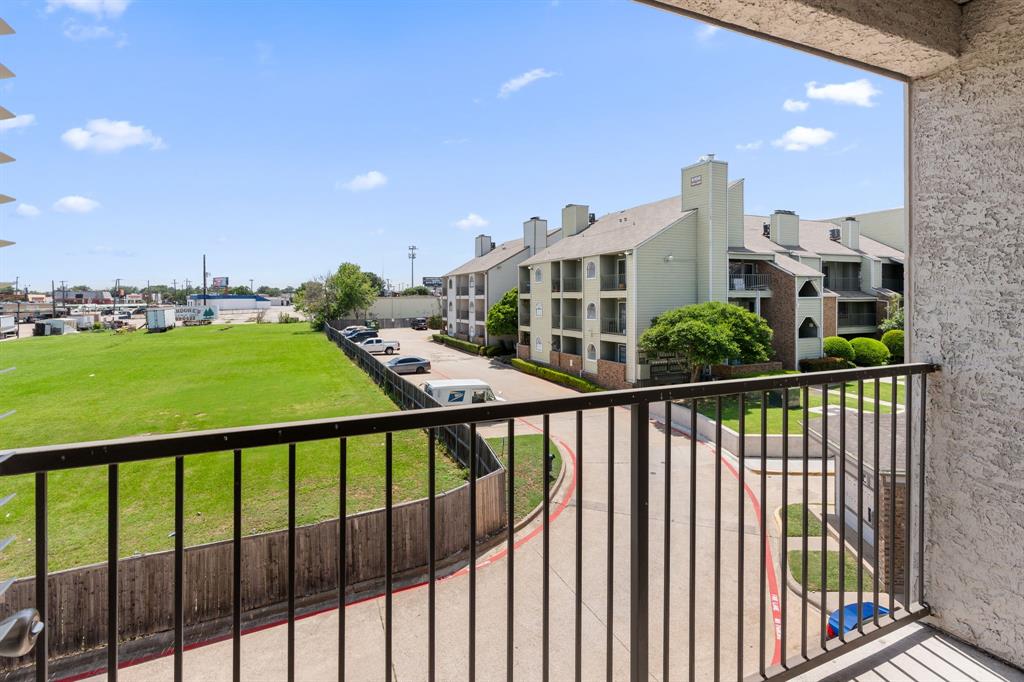 6108 Abrams Road, Unit 521 Dallas, TX 75231 - Photo 21 of 31 a view of city from a balcony