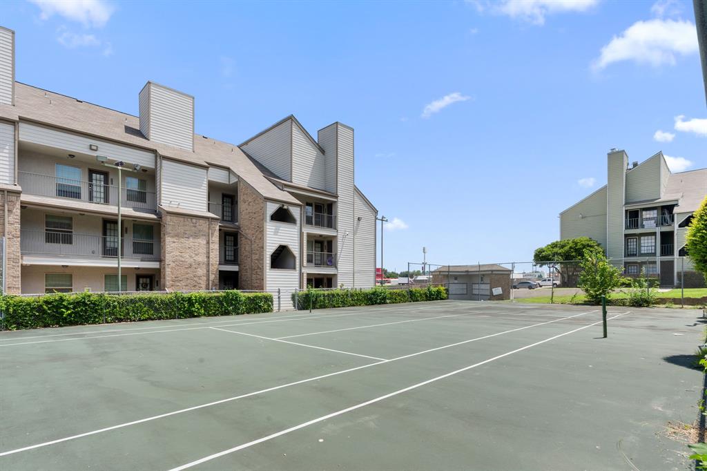 6108 Abrams Road, Unit 521 Dallas, TX 75231 - Photo 24 of 31 a view of a building with a street
