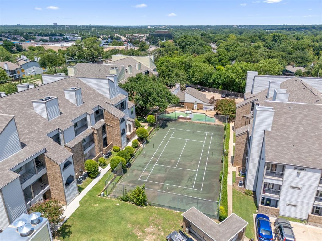 6108 Abrams Road, Unit 521 Dallas, TX 75231 - Photo 30 of 31 an aerial view of a house with a yard