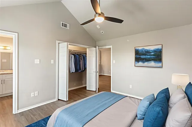 a bedroom with a bed and a view of bedroom