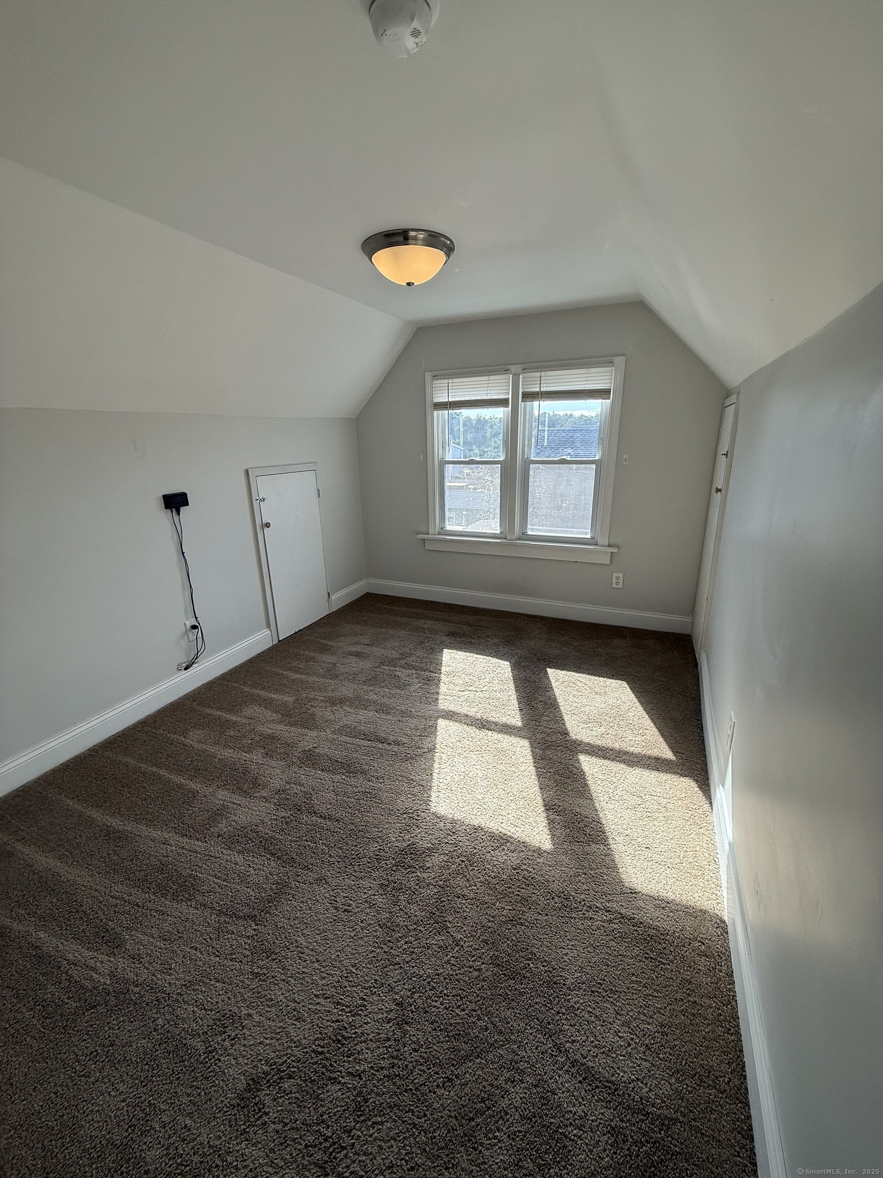 128 Spring Street West Haven, CT 06516 - Photo 18 of 23 a view of empty room with window