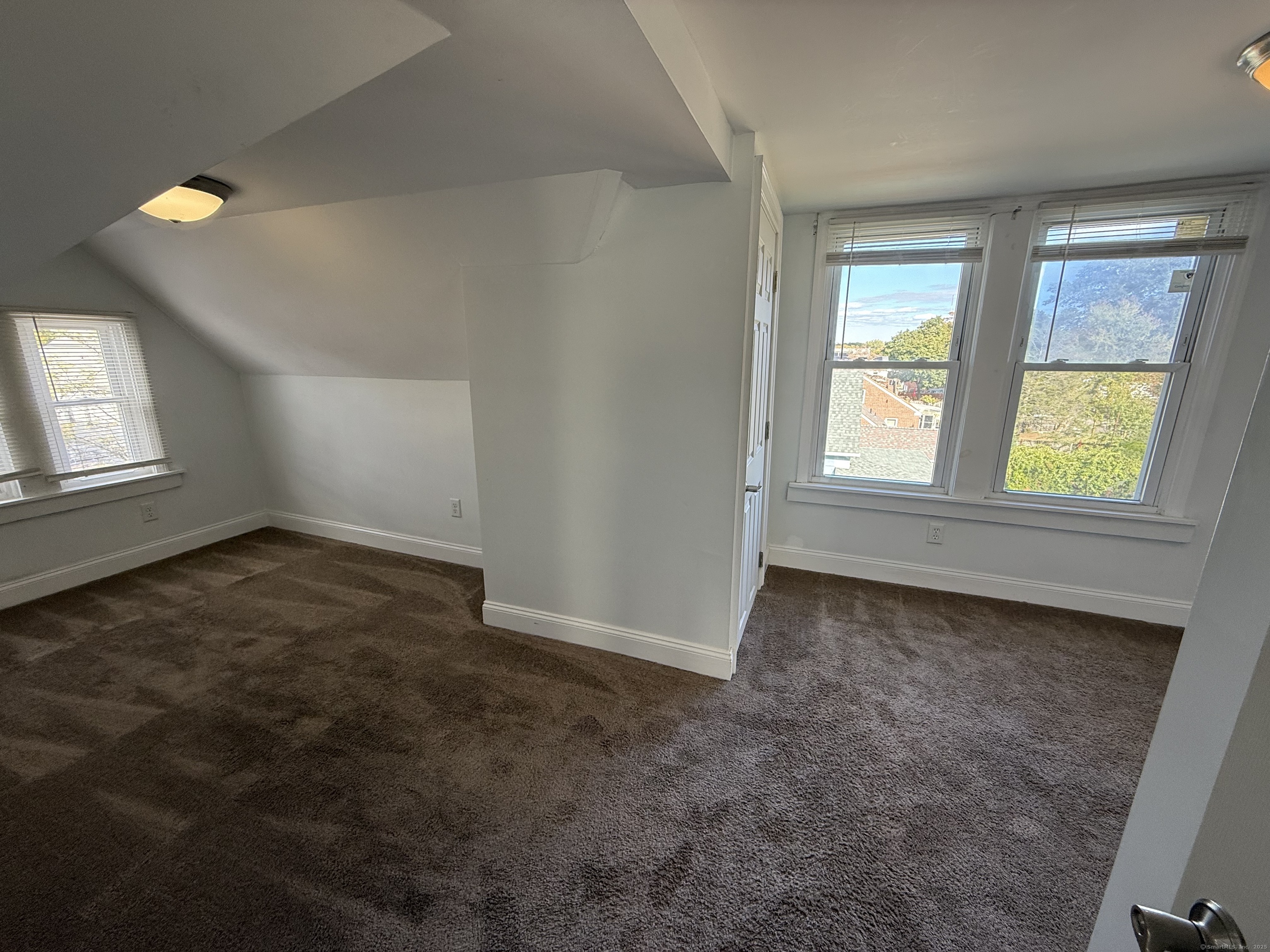 128 Spring Street West Haven, CT 06516 - Photo 20 of 23 an empty room with windows
