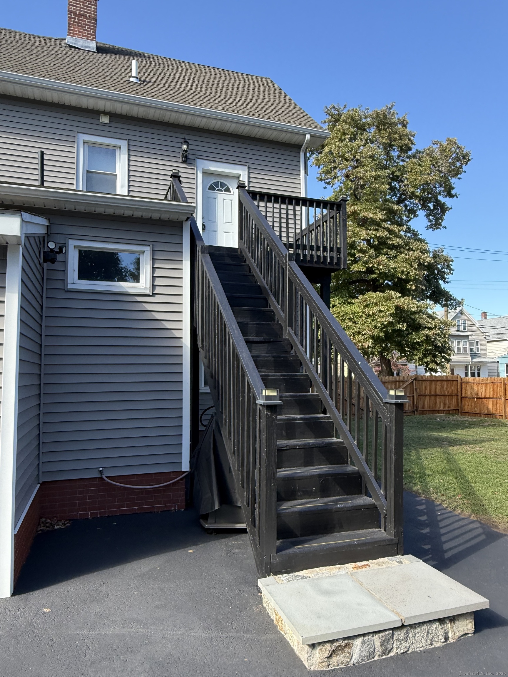 128 Spring Street West Haven, CT 06516 - Photo 23 of 23 a view of a house with a deck