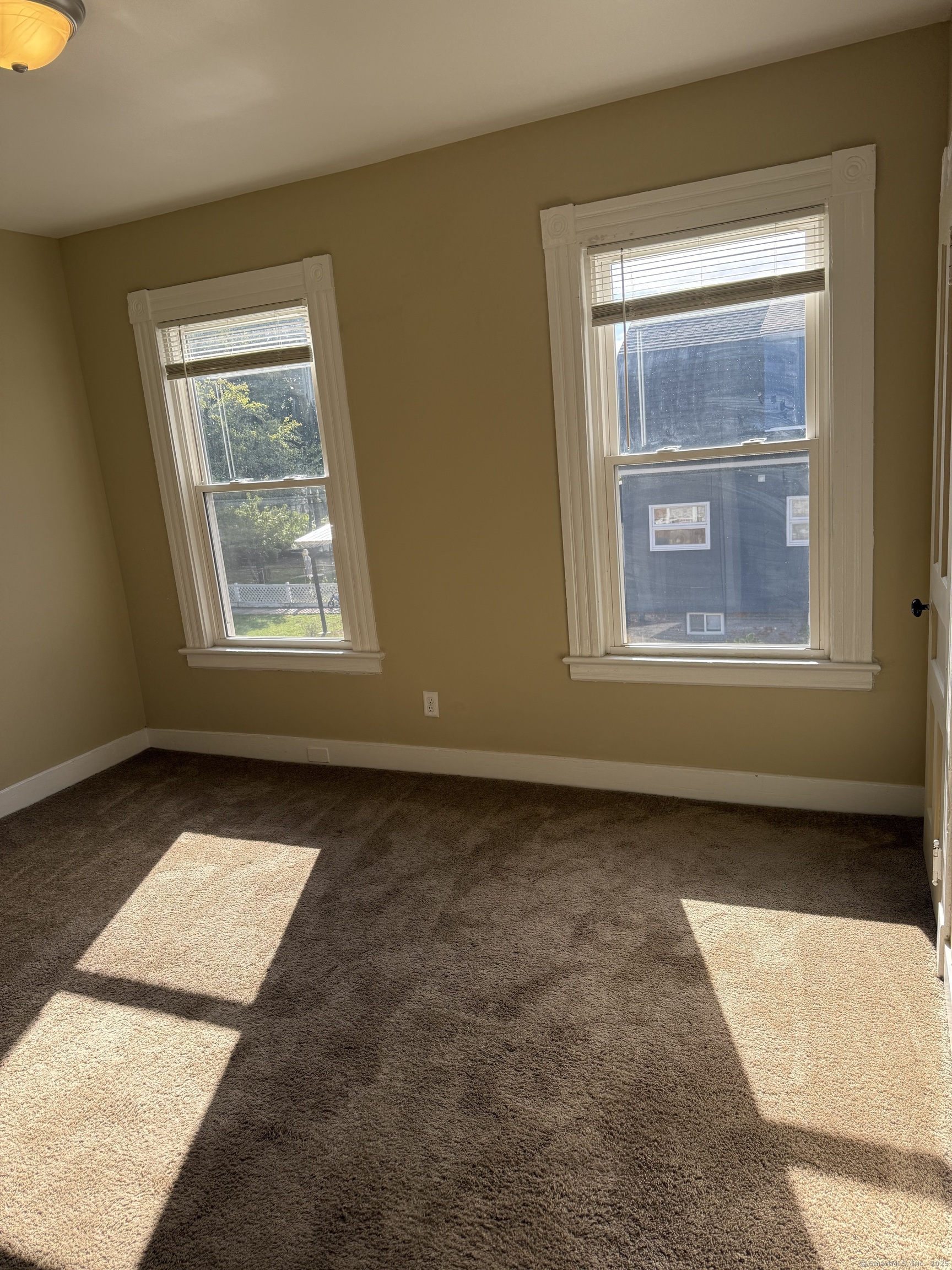128 Spring Street West Haven, CT 06516 - Photo 10 of 23 an empty room with a window