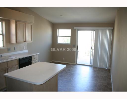 8052 Cimarron Ridge Drive, Unit 201 Las Vegas, NV 89128 - Photo 4 of 12 Kitchen.