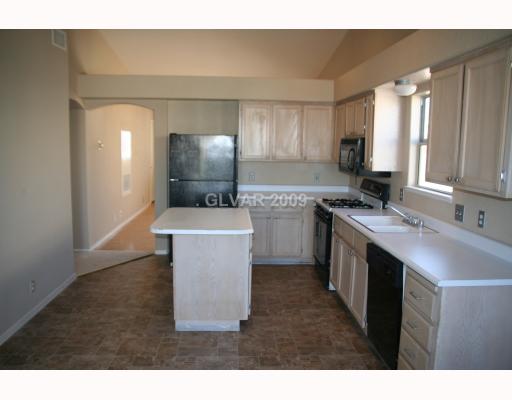 8052 Cimarron Ridge Drive, Unit 201 Las Vegas, NV 89128 - Photo 5 of 12 Kitchen.
