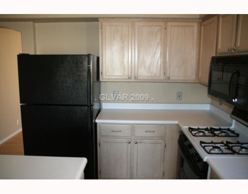 8052 Cimarron Ridge Drive, Unit 201 Las Vegas, NV 89128 - Photo 6 of 12 Kitchen.