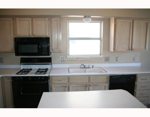 8052 Cimarron Ridge Drive, Unit 201 Las Vegas, NV 89128 - Photo 7 of 12 Kitchen.