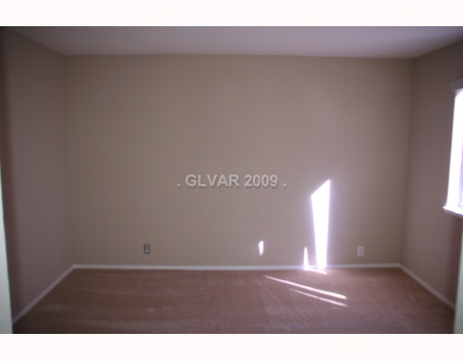 8052 Cimarron Ridge Drive, Unit 201 Las Vegas, NV 89128 - Photo 8 of 12 Master Bedroom.