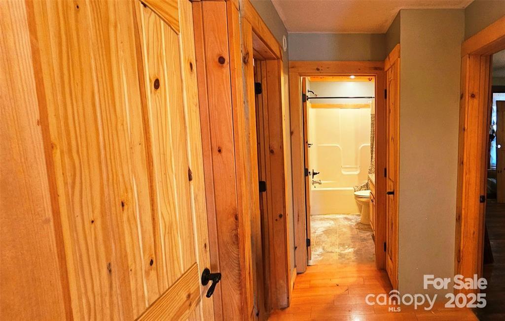 1491 Landrum Road Columbus, NC 28722 - Photo 12 of 15 a view of a bathroom with shower and a tub