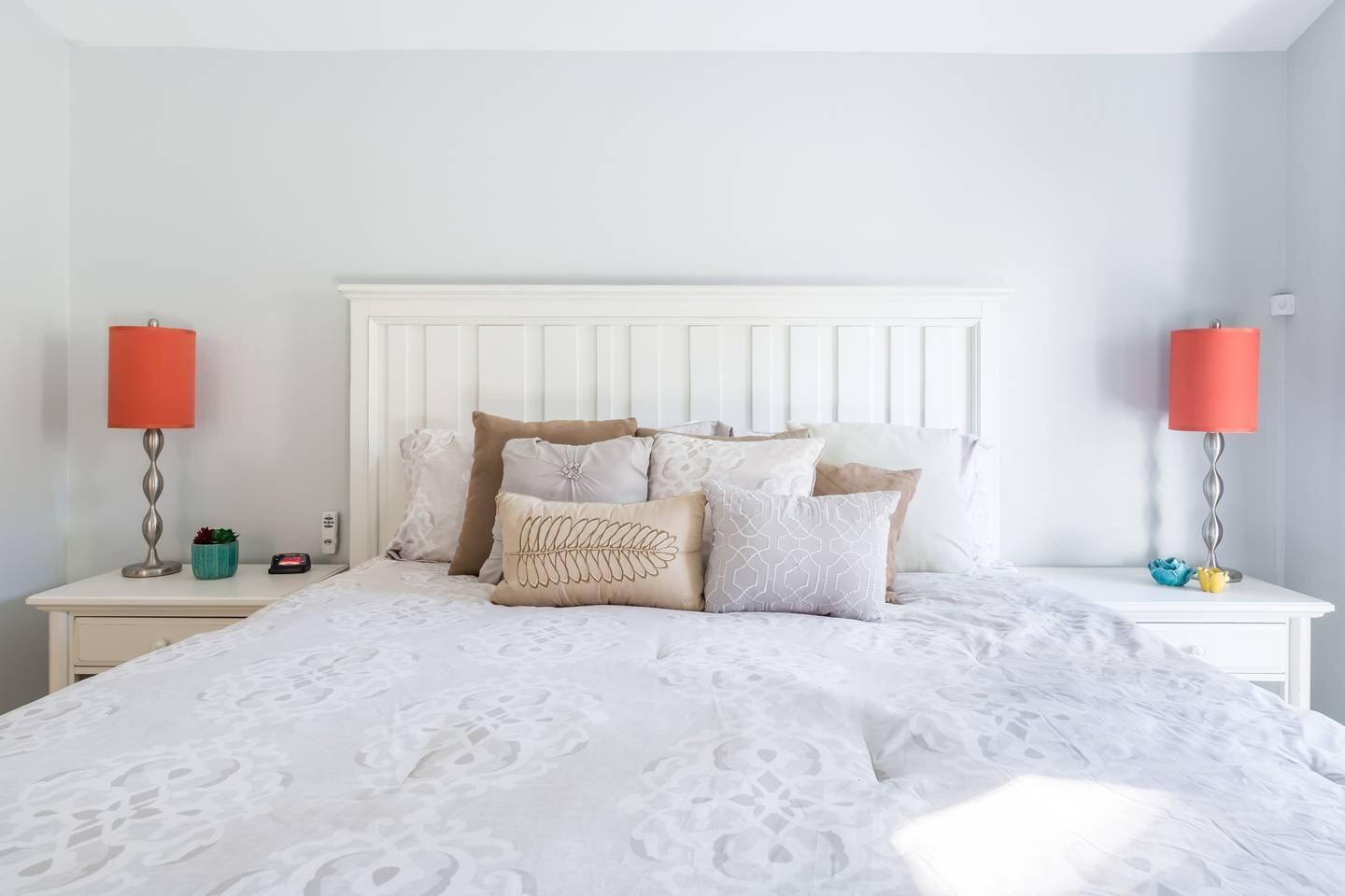 82191 Waring Way Indio, CA 92201 - Photo 14 of 42 a bedroom with a bed and a lamp