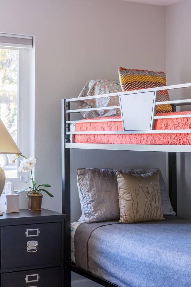 82191 Waring Way Indio, CA 92201 - Photo 26 of 42 a bed sitting in a bedroom next to a window