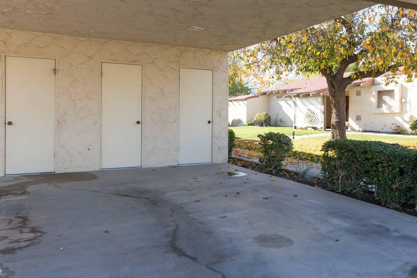 82191 Waring Way Indio, CA 92201 - Photo 3 of 42 a view of a house with a trees