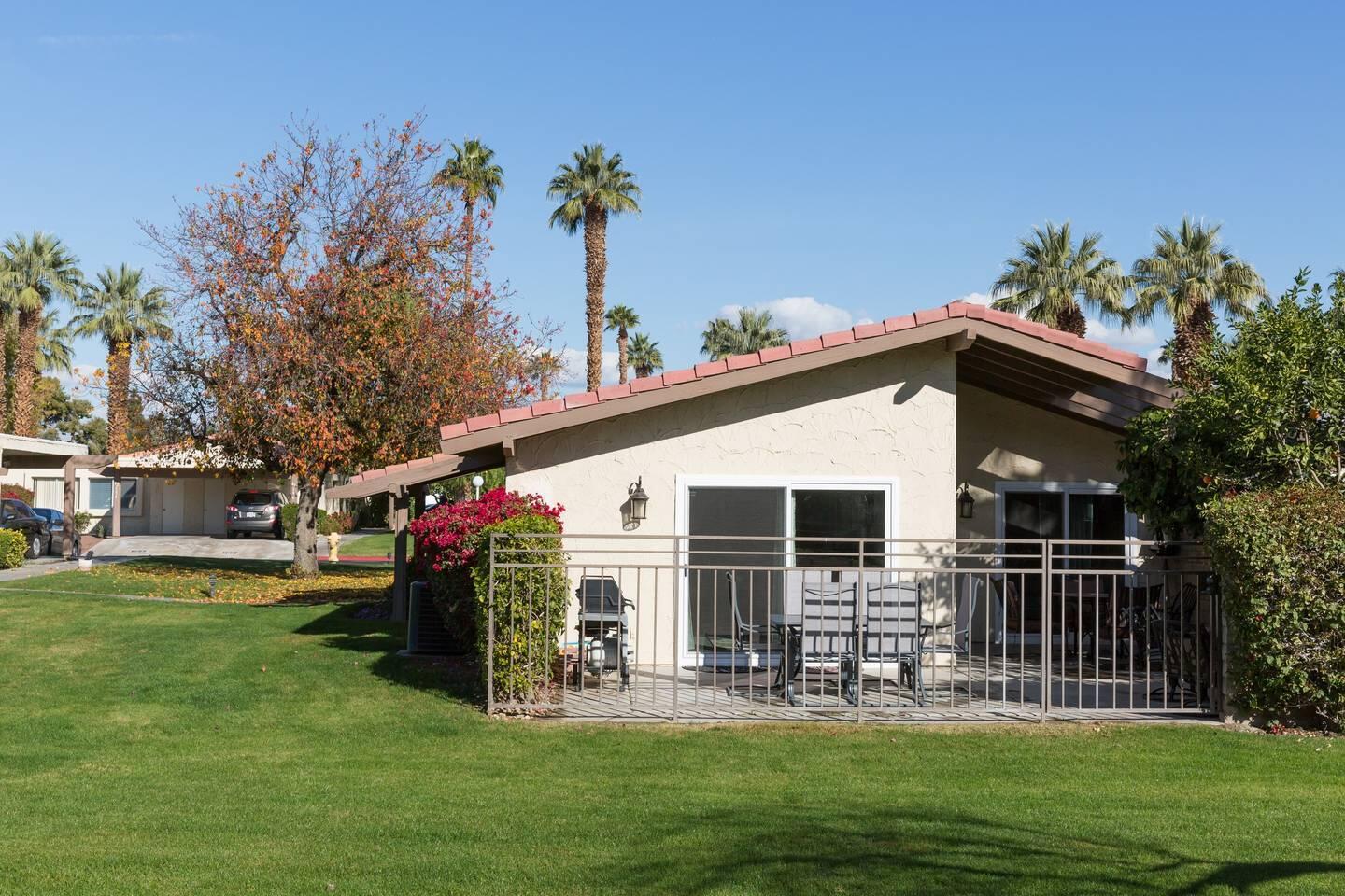 82191 Waring Way Indio, CA 92201 - Photo 33 of 42 a view of a house with a yard and sitting area