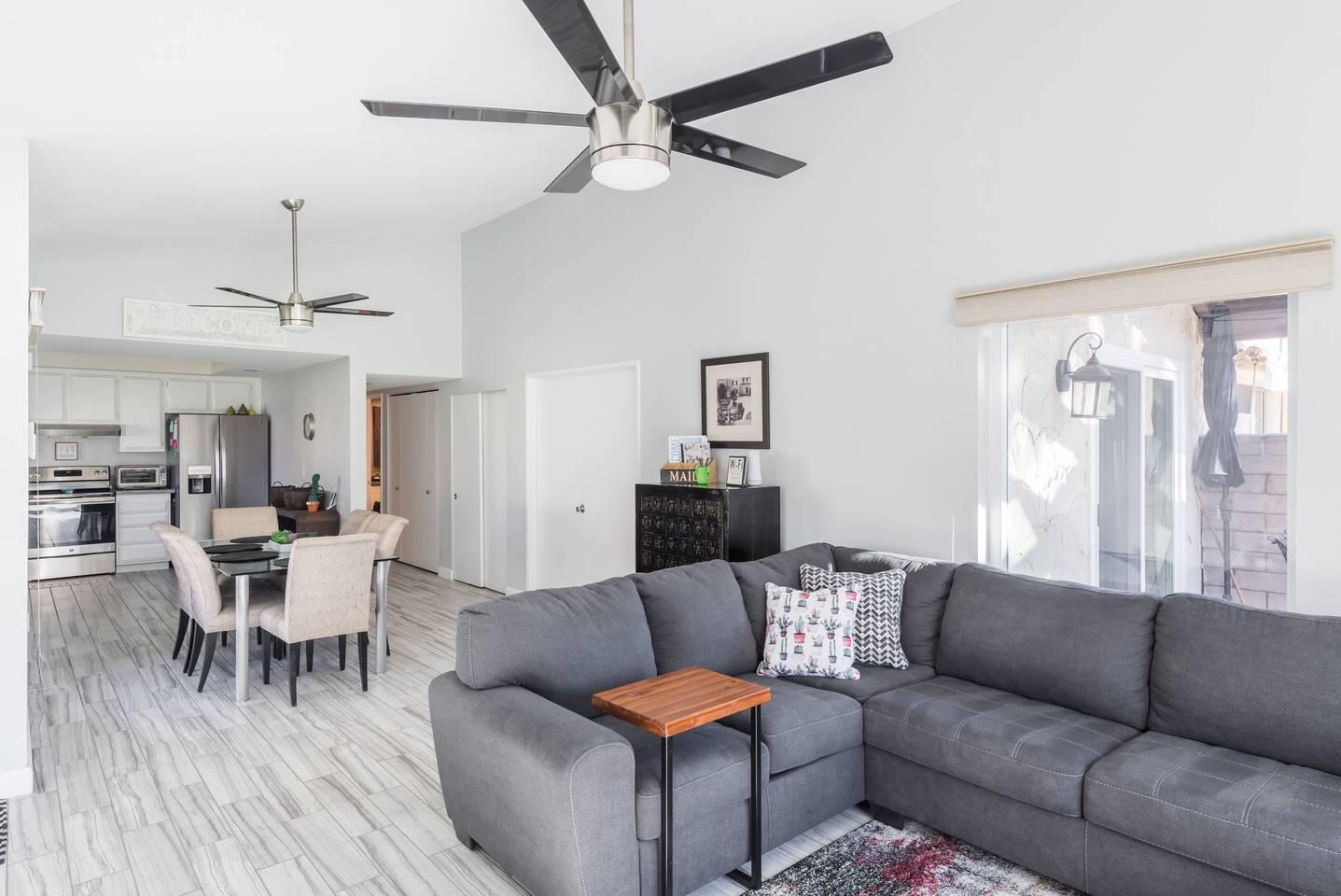 82191 Waring Way Indio, CA 92201 - Photo 4 of 42 a living room with furniture and a ceiling fan