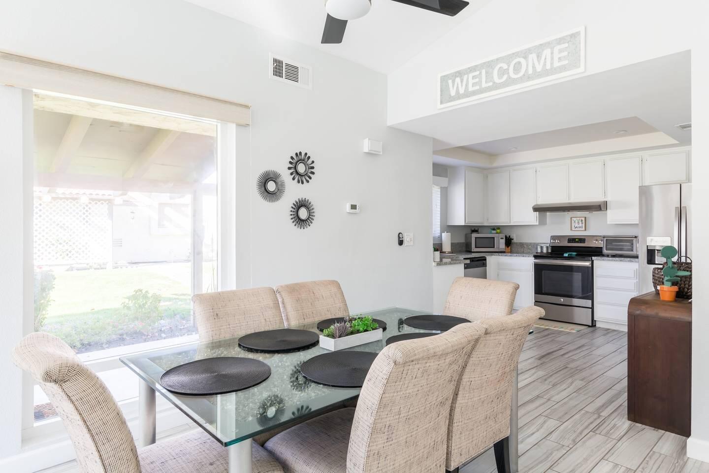 82191 Waring Way Indio, CA 92201 - Photo 5 of 42 a living room with furniture and kitchen view