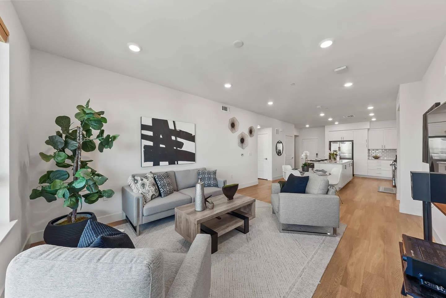 5925 Charlotte Drive, Unit 414 San Jose, CA 95123 - Photo 5 of 18 a living room with furniture and a potted plant