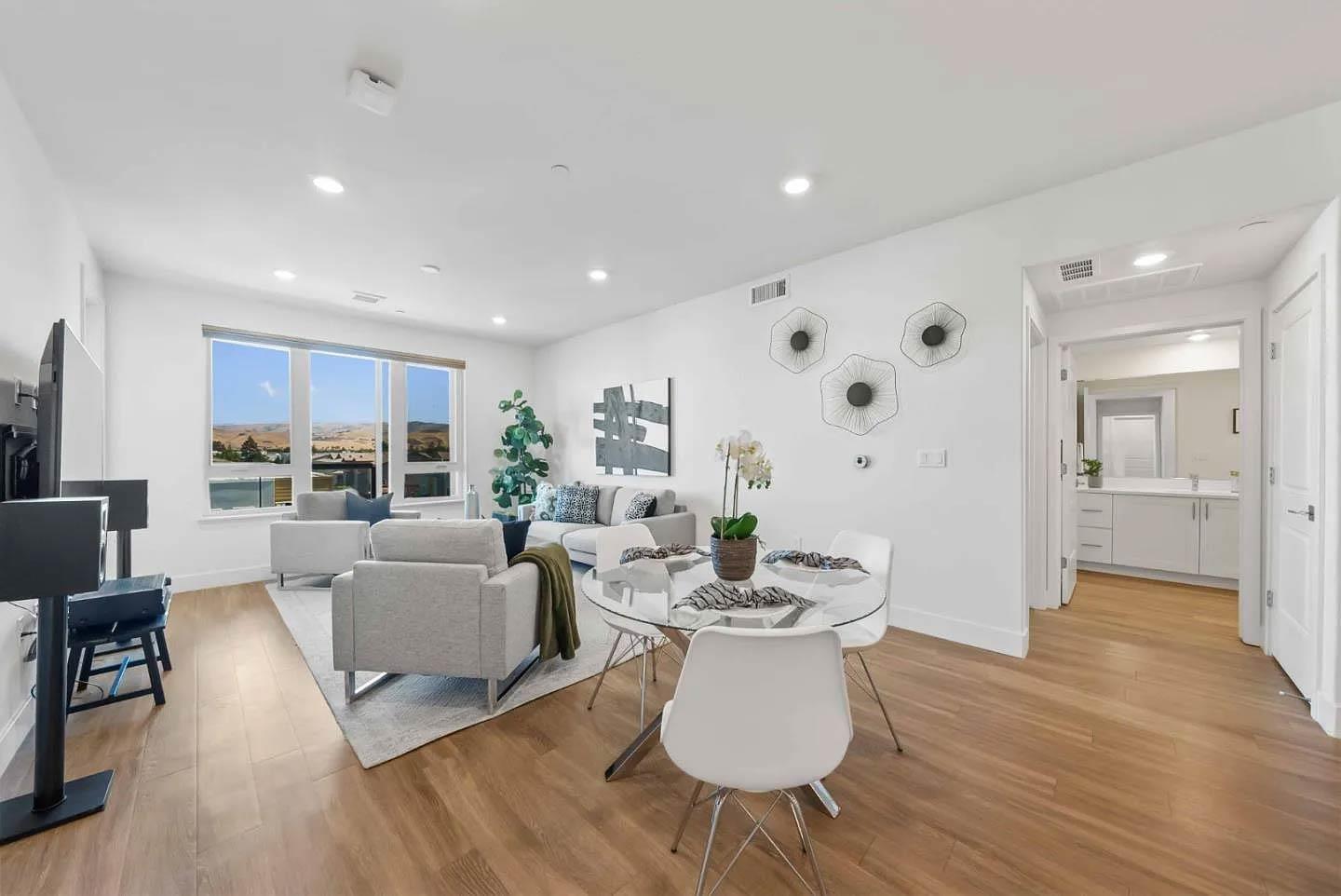 5925 Charlotte Drive, Unit 414 San Jose, CA 95123 - Photo 6 of 18 a living room with furniture and a large window