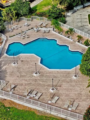 a view of a lake with a city skyline in the background