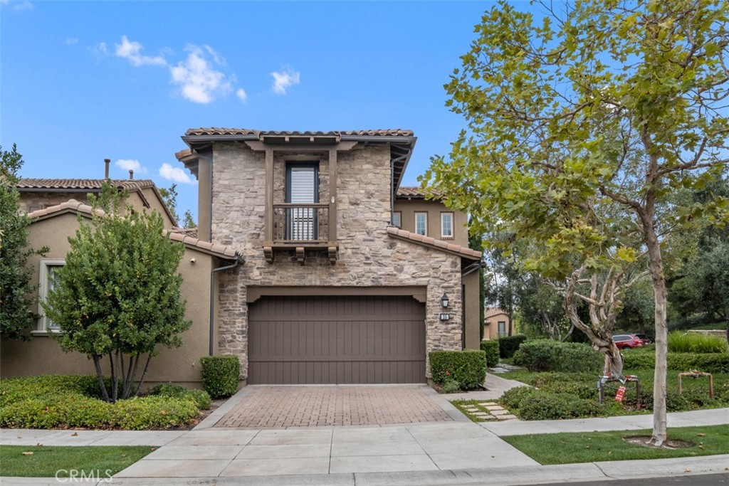 a front view of a house with yard