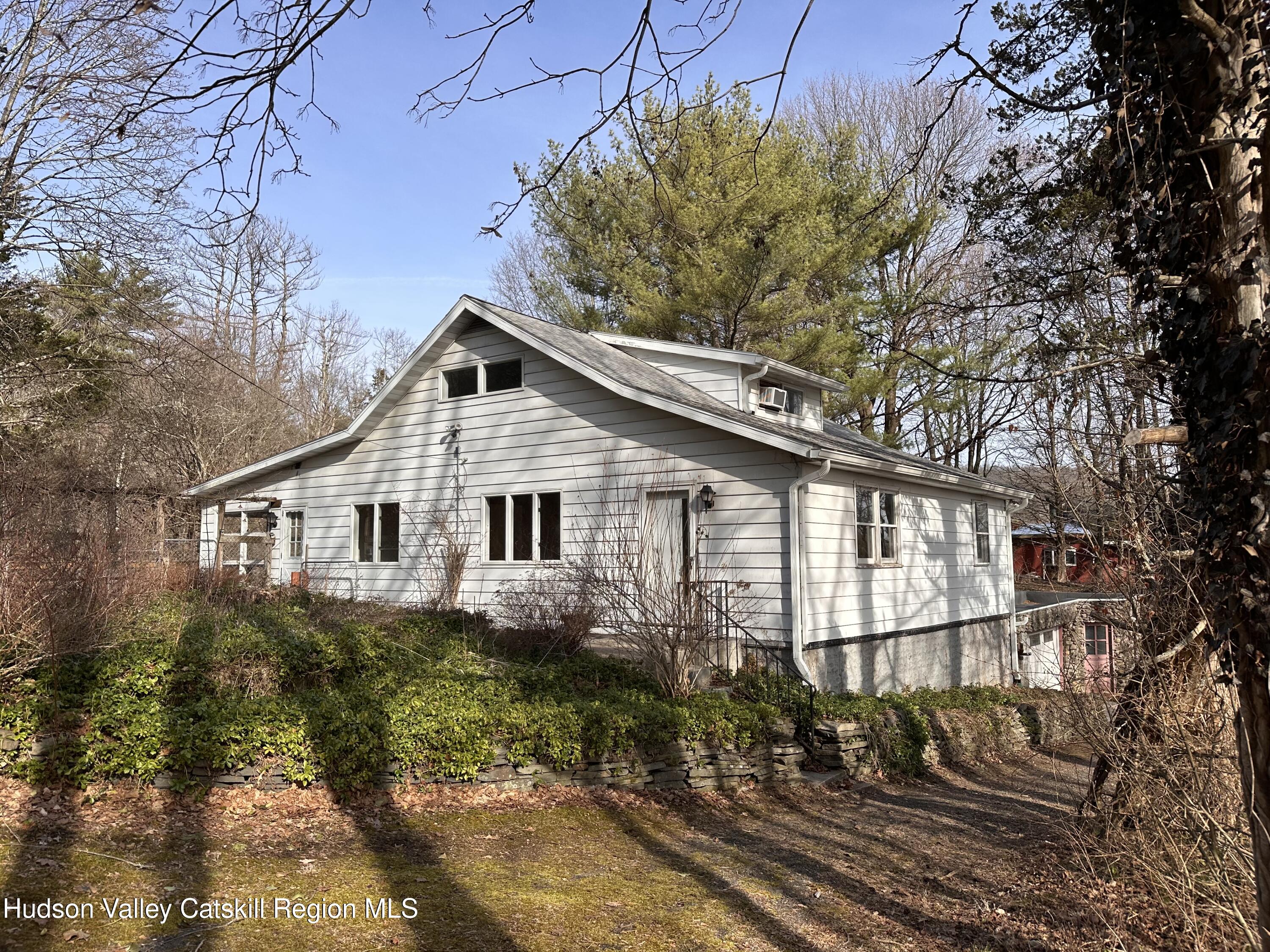 197 Old Rte 32 Saugerties, NY 12477 - Photo 1 of 31 a front view of a house with a yard
