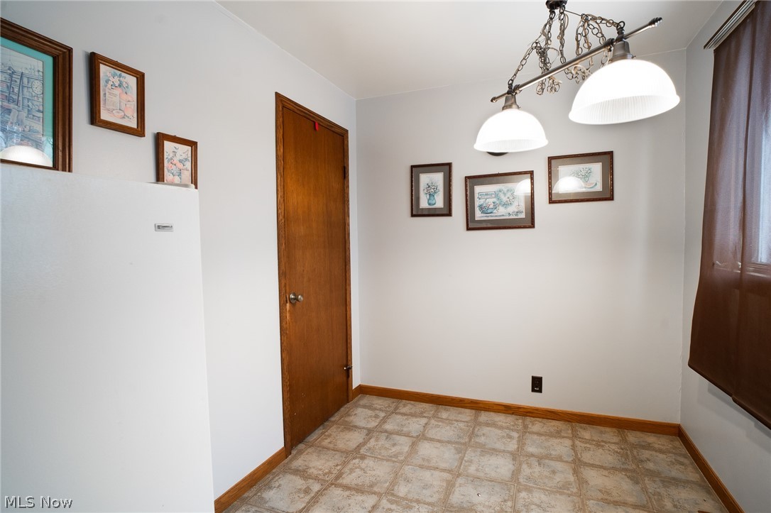 11 Pacific Road Northeast Carrollton, OH 44615 - Photo 15 of 46 Breakfast nook with door to large pantry
