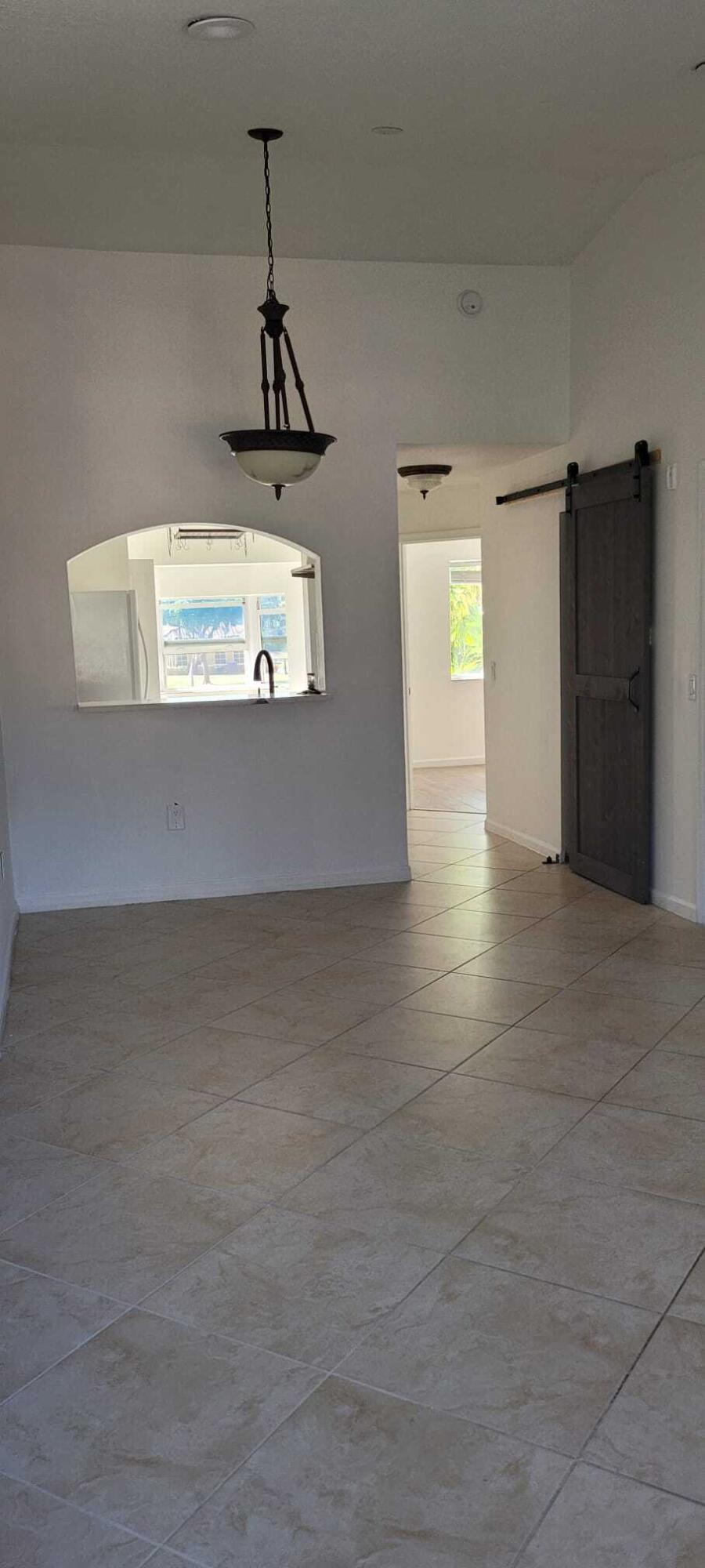 3478 Briar Bay Boulevard, Unit 202 West Palm Beach, FL 33411 - Photo 10 of 23 a view of an empty room