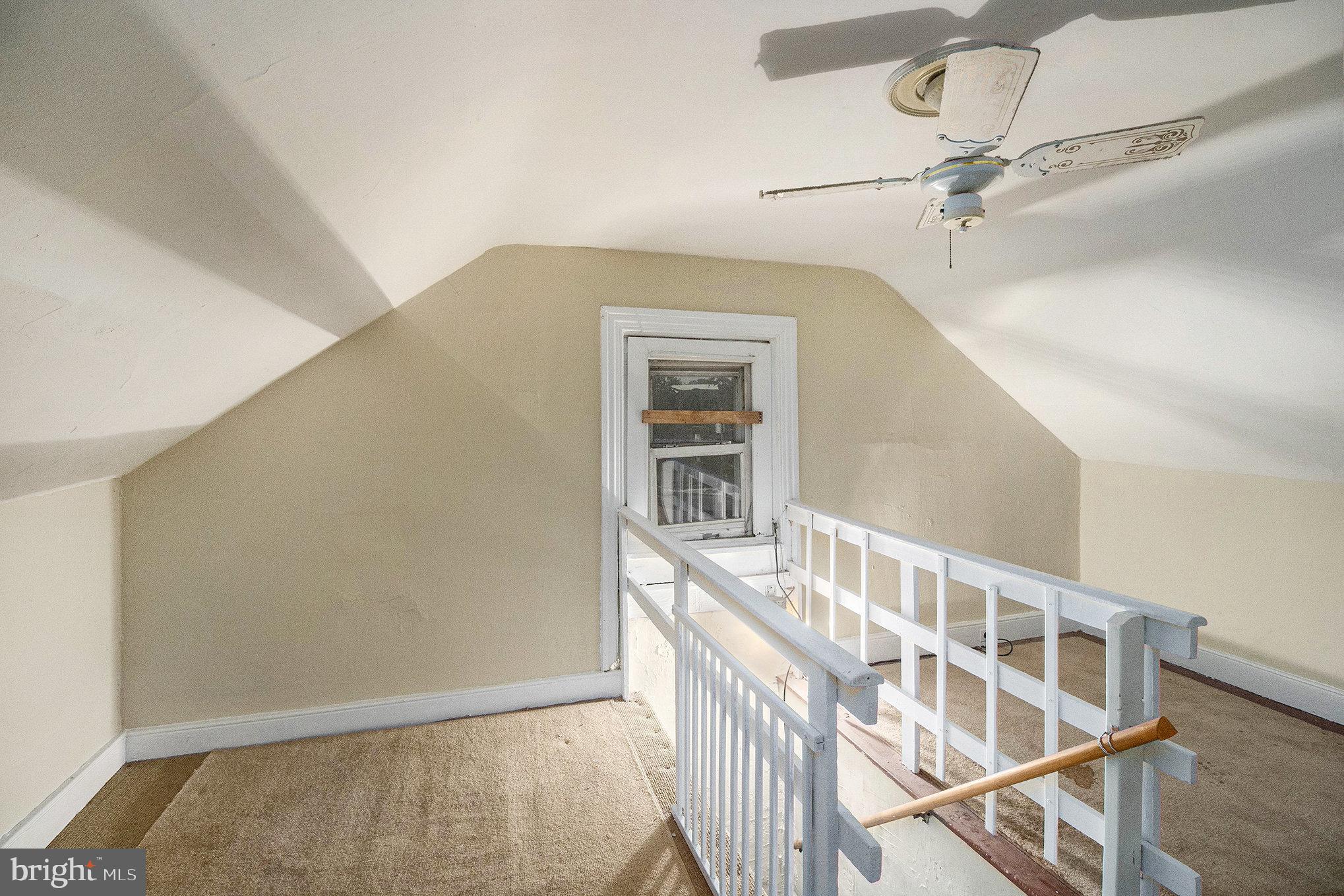 809 George Street Norristown, PA 19401 - Photo 16 of 24 a view of staircase with white walls and fan
