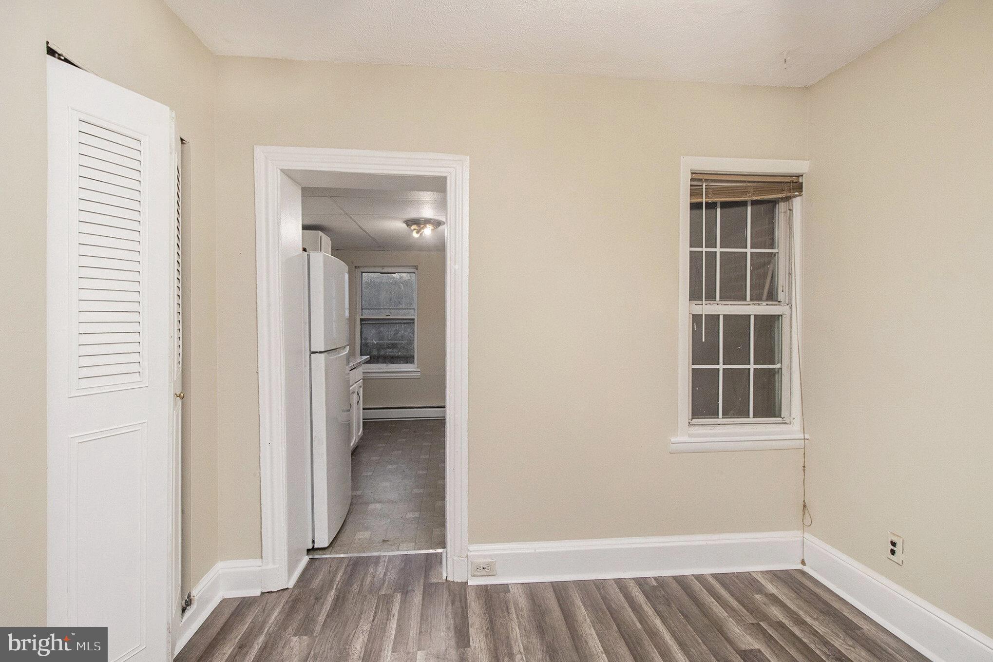 809 George Street Norristown, PA 19401 - Photo 5 of 24 an entryway of a room and wooden floor