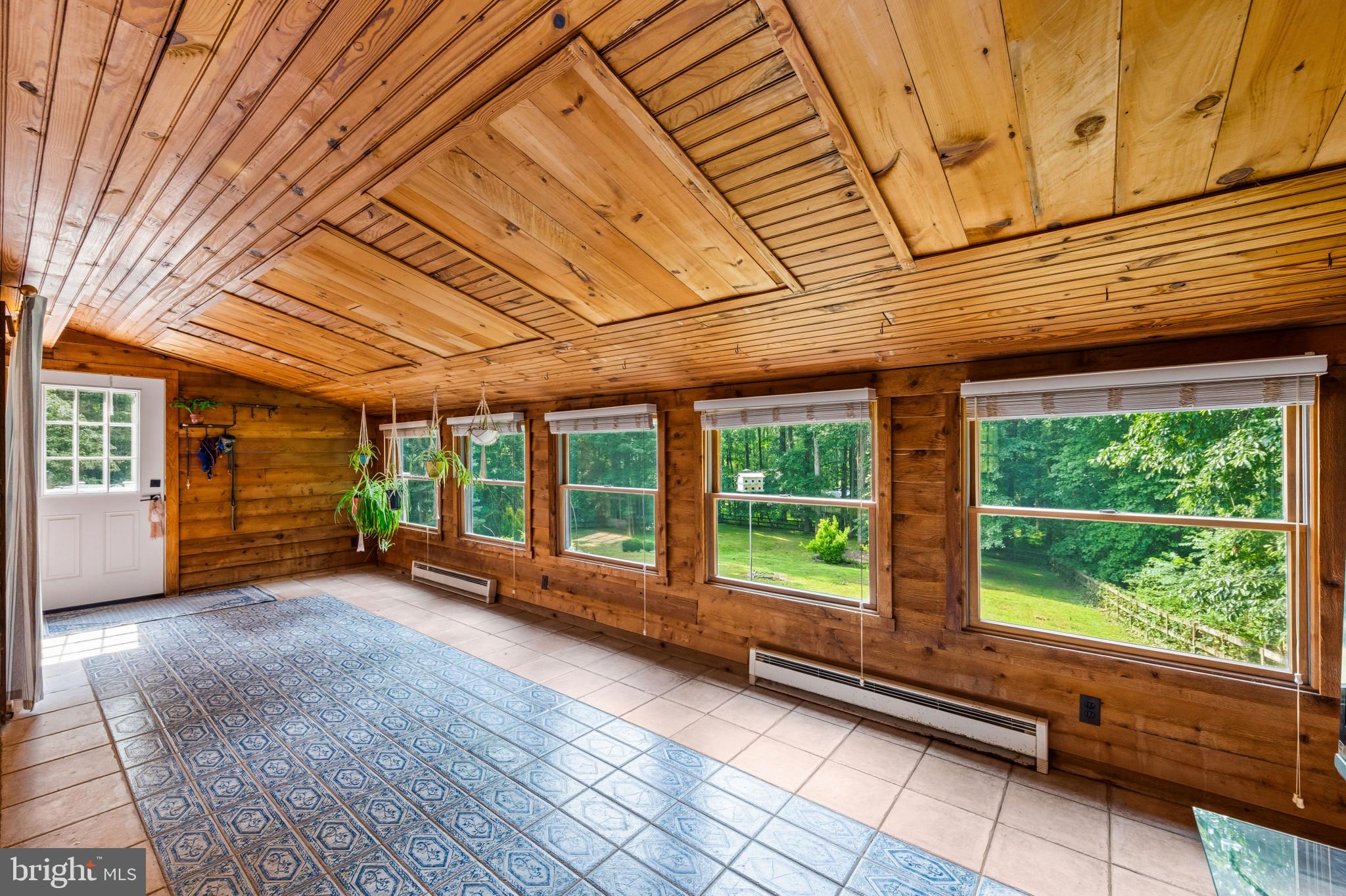 2702 Bird View Road Westminster, MD 21157 - Photo 16 of 41 a view of a room with wooden floor and roof