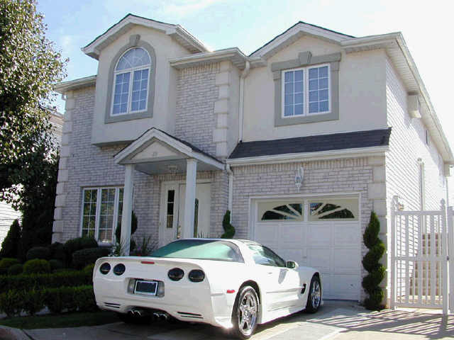 a front view of a house with a balcony
