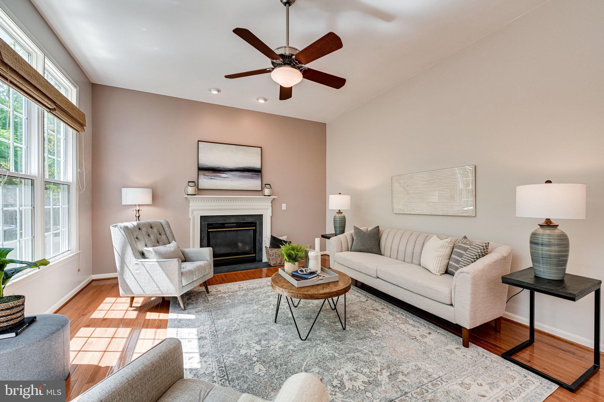 7829 Gambrill Woods Way Springfield, VA 22153 - Photo 21 of 57 Family Room w/ Fireplace & Ceiling Fan