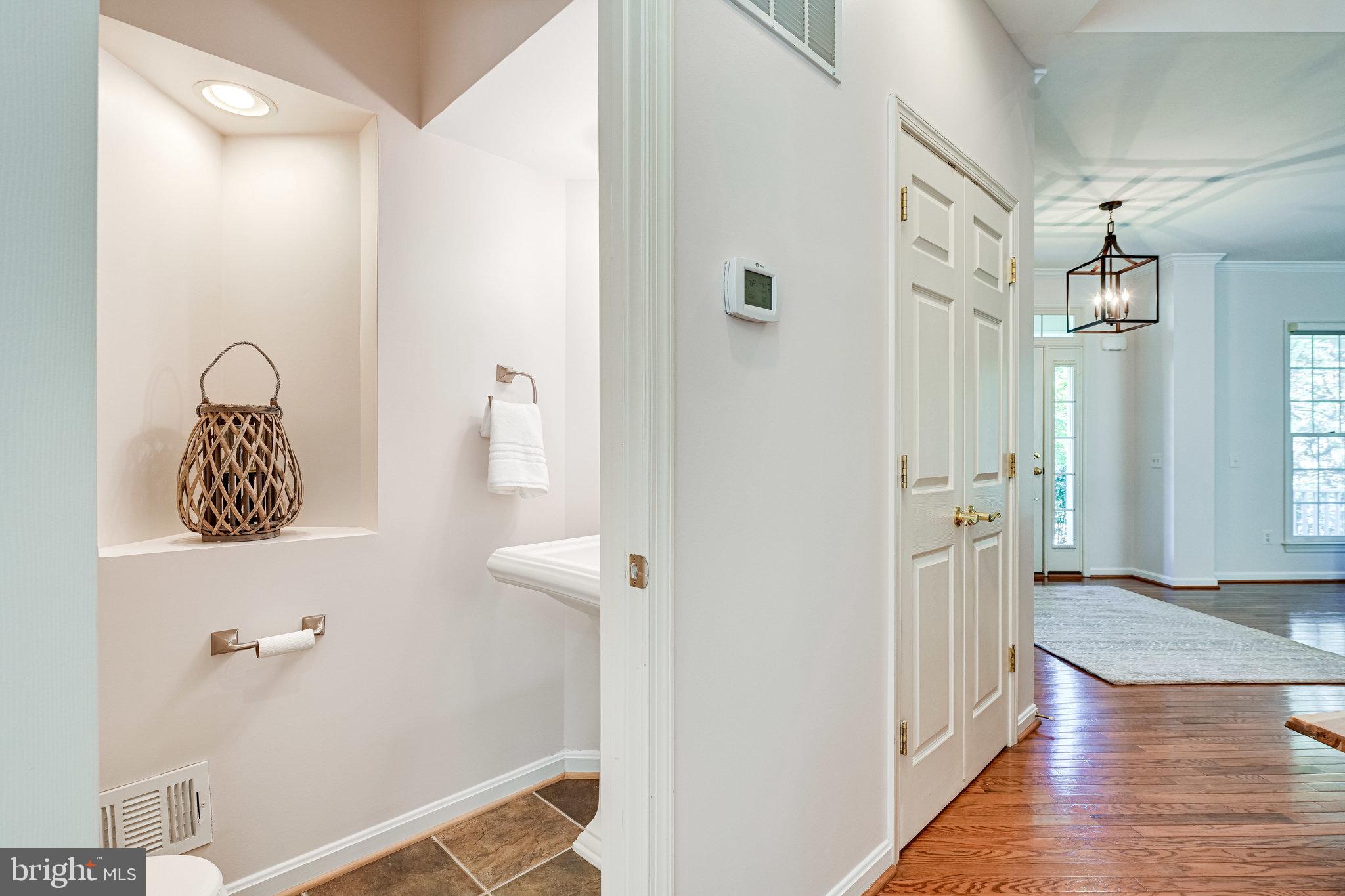 7829 Gambrill Woods Way Springfield, VA 22153 - Photo 22 of 57 Main level Powder Room & Coat Closet