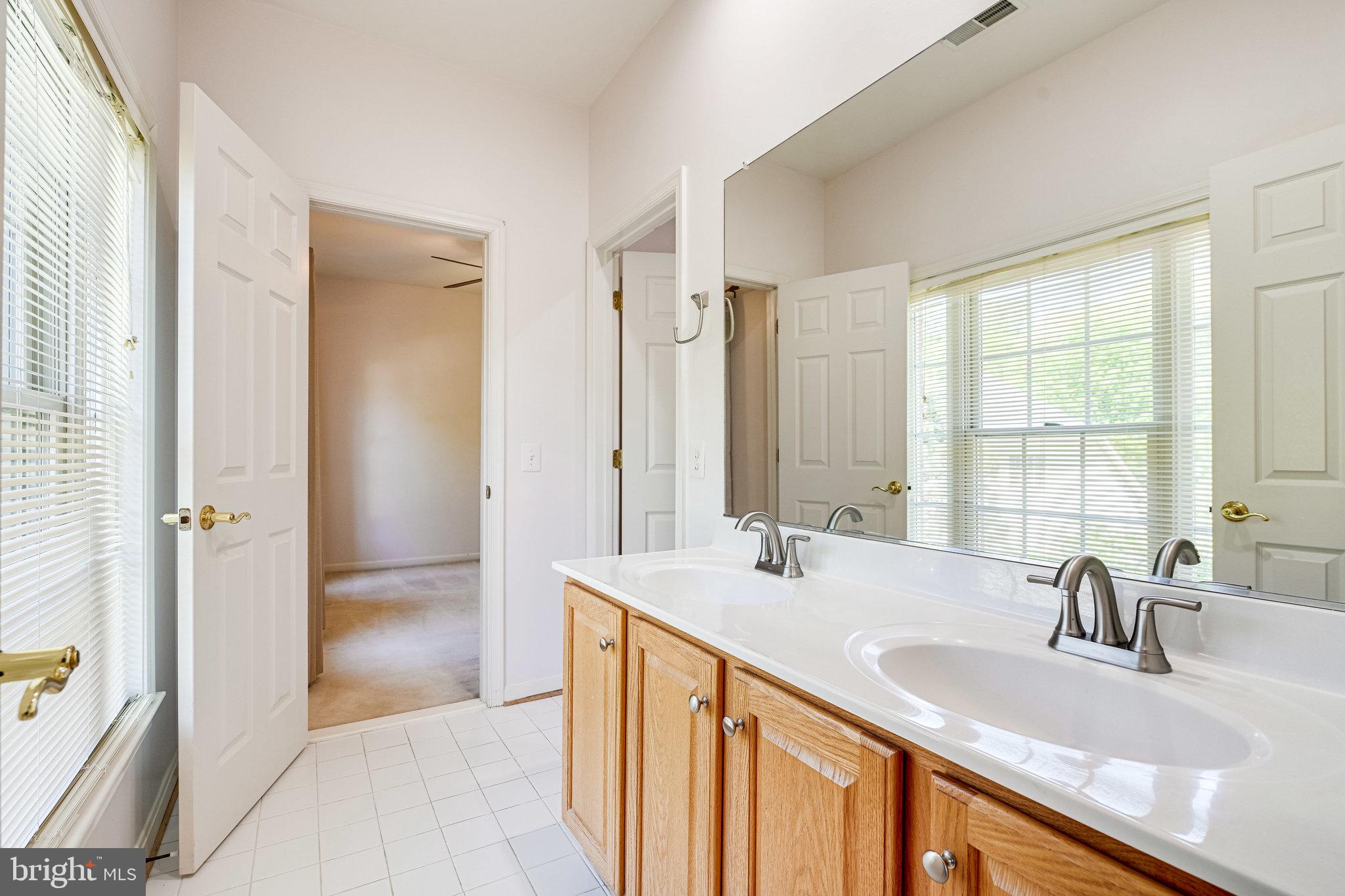 7829 Gambrill Woods Way Springfield, VA 22153 - Photo 38 of 57 Full Jack & Jill Bath leading to Bedroom 3